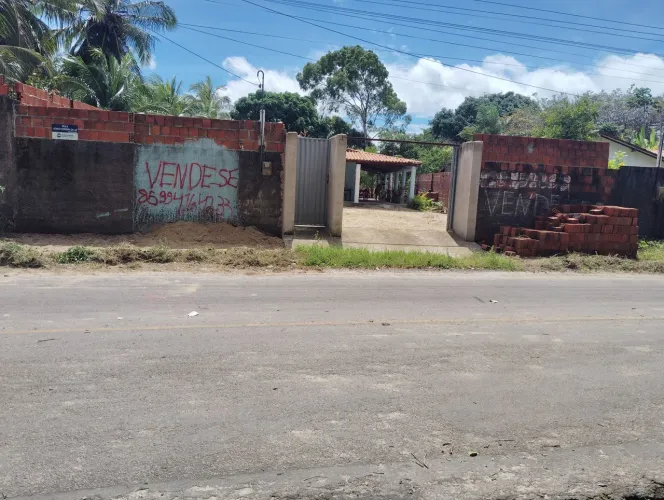 Vendo casa com terreno
