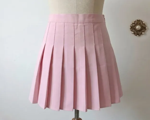 shorts saia plissada rosa cintura alta