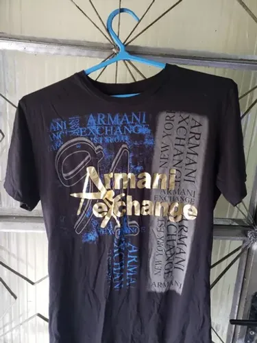 Camisa preta em perfeito estado tamanho