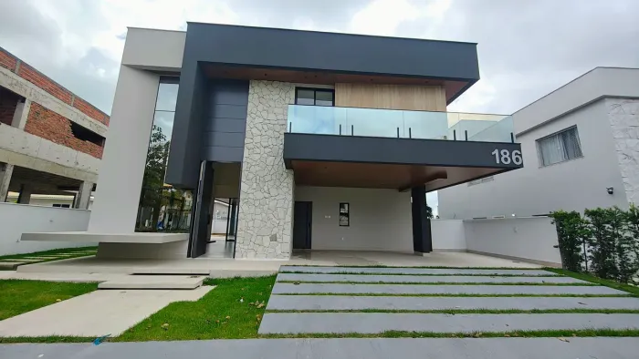 Casa no Alphaville com 5 suítes e elevador