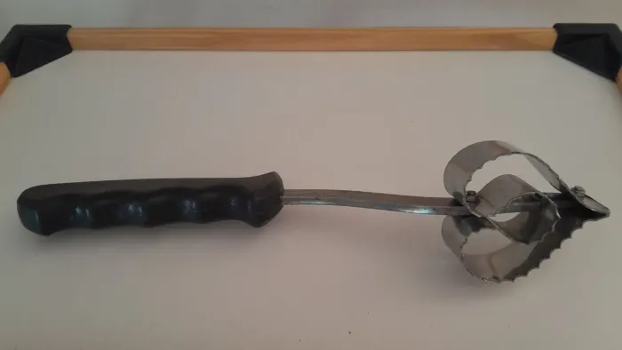 Raspador de escamas de peixe.