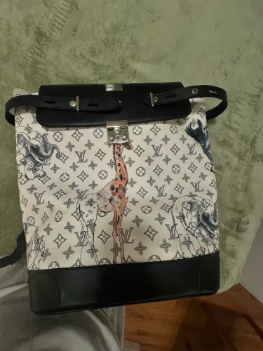 Mochila louis v modelo chapman brothers pouco uso em couro com cadeado