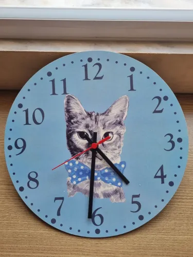 Relógio de parede com gato