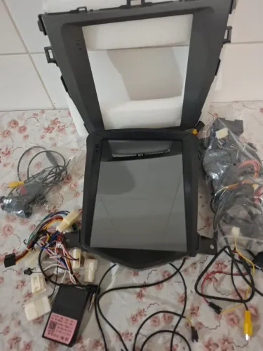 Multimida tesla 9.5 com moldura Chico e câmera de re