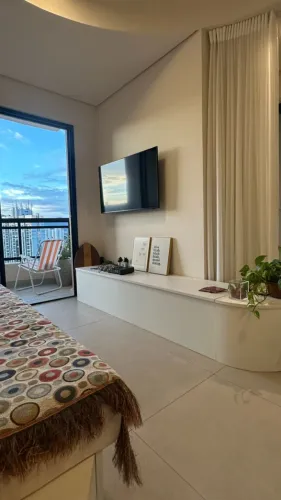 Studio novo mobiliado 39m2, vista, ar-condicionado e vaga coberta
