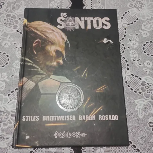 Livro Os Santos, Capa dura