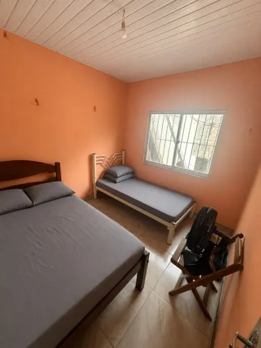 Casa aconchegante a poucos passos da praia