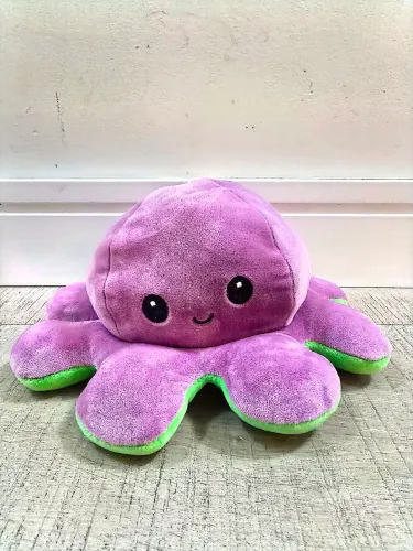Polvinho do humor verde e roxo