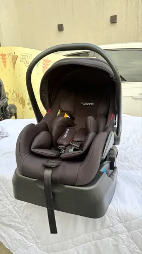 Bebê conforto kiddo com suporte
