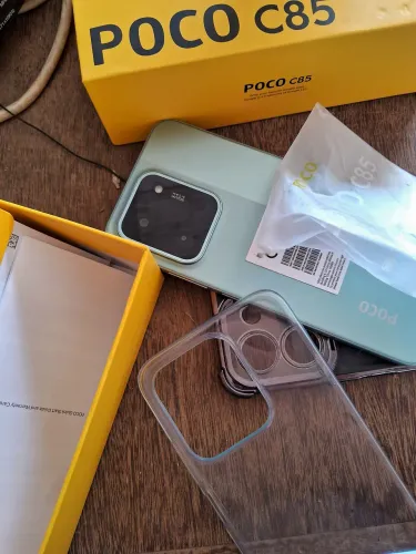 Celular poco c85 128g 6.000mh nota fiscal na garantia 3 meses de uso compl. 500,00 .