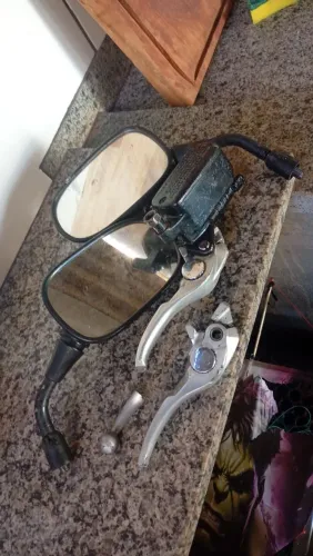 Vende-se manete e retrovisor de hornat original