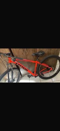 ? Vendo bicicleta Lotus aro 29! Laranja e preta, com câmbio Shimano e suspensão dianteir