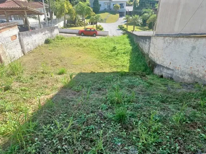 Excelente terreno de 495 metros quadrados com escritura pública a 500 metros da BR 282