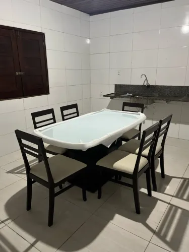 Mesa de vidro com 6 cadeiras
