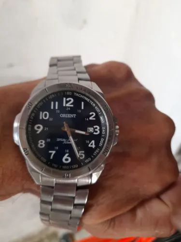 Vendo um relógio orient funcionando perfeitamente 