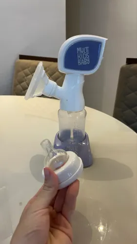 Bomba de leite extratora carregavel