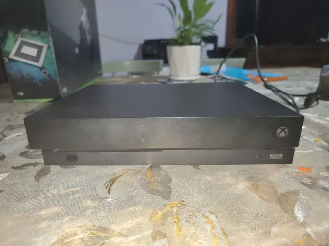 Xbox one x com defeito do plim.