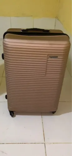 Mala de viagem rosa cobre