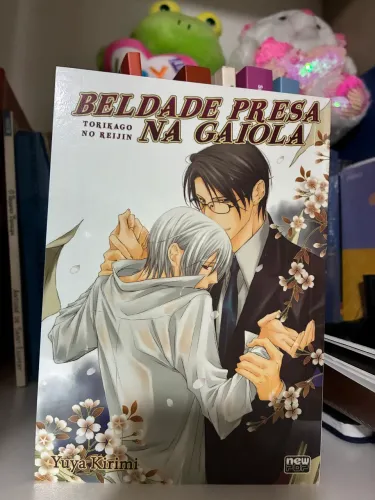 Beldade presa na gaiola mangá