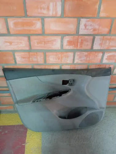 Forro porta motorista Toyota Corolla 2009/2014