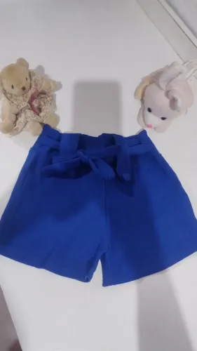 Shortinho azul social lindo, nunca usado,amarradinho na frente, tamanho 3/4 anos,20 reais