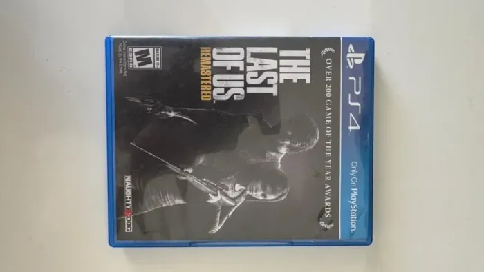 THE LAST OF US REMASTERED PS4 ORIGINAL MIDIA FISICA COM CAIXA