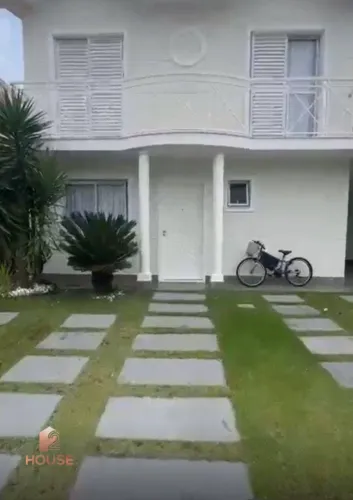 Casa com 3 dormitórios à venda, 202 m² por R$ 2.100.000,00 - Condomínio Sunville - Arujá/S