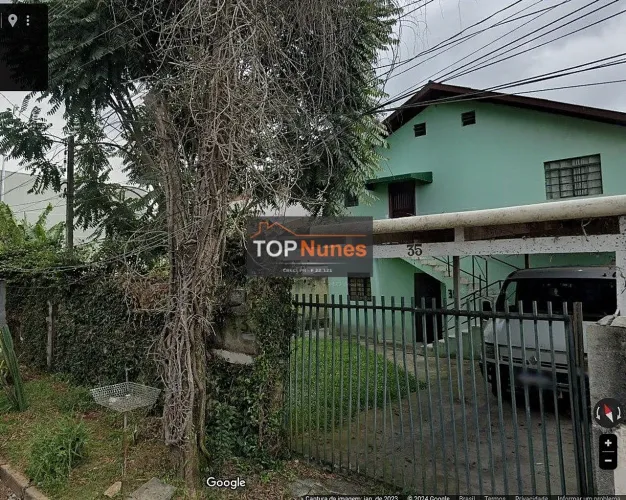 Dois terrenos com uma casa em cada um no Sta. Quitéria