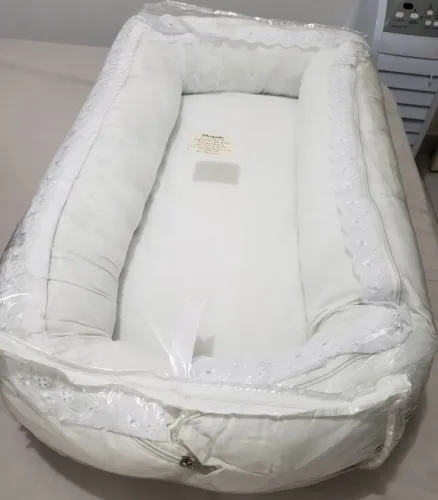 Ninho redutor de bebê