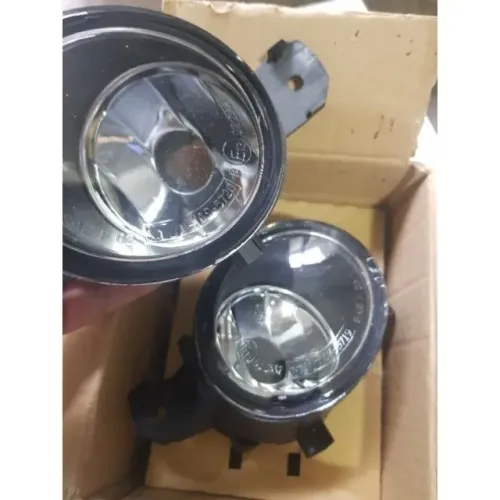 PAR Farol Milha Versa Sentra March Clio Master - Marca Tyc