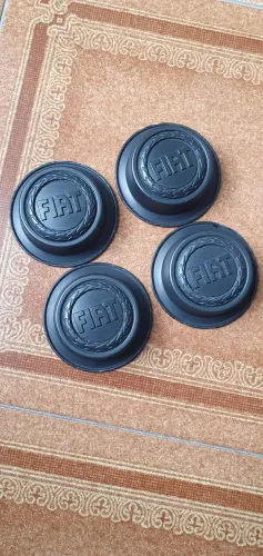 Calotinha central rodas fiat jogo