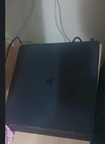 Playstation 4 slim 500 gb com 2 controles funcionando normalmente com 1 hd ext de 1tb