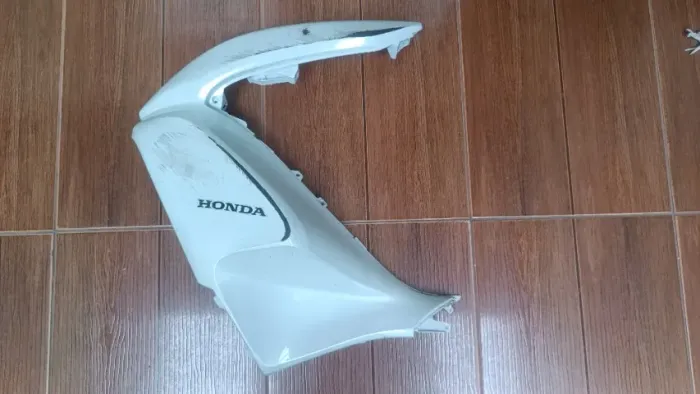 Carenagem farol esquerda PCX 150 até 2015