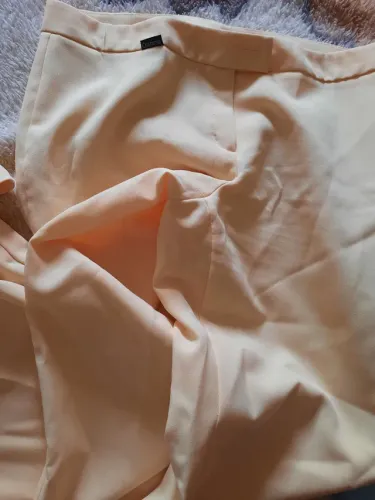 Conjunto feminino calca e casaquinho