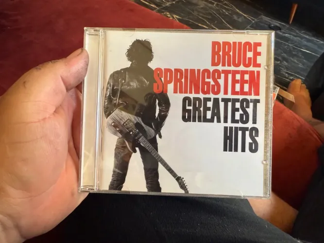 CDs bruce springsteen e Bryan Adans