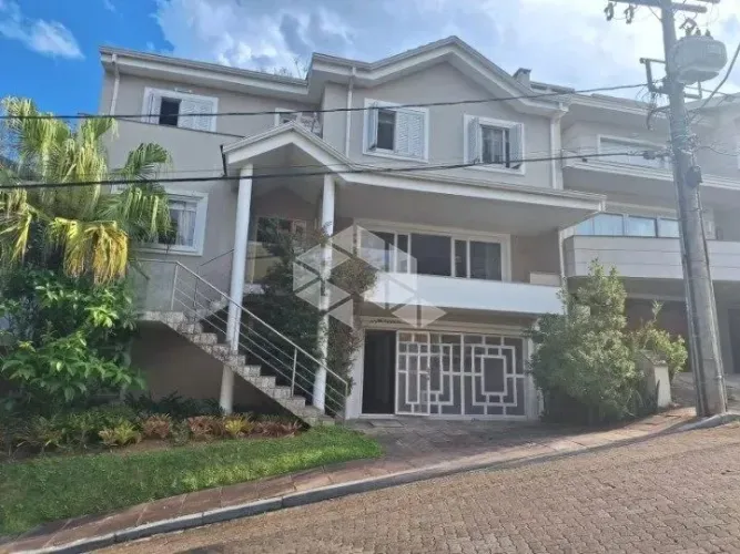 Casa em condomínio com 3 suítes e 3 vagas de garagem no Bairro Agronomia em Porto Alegre