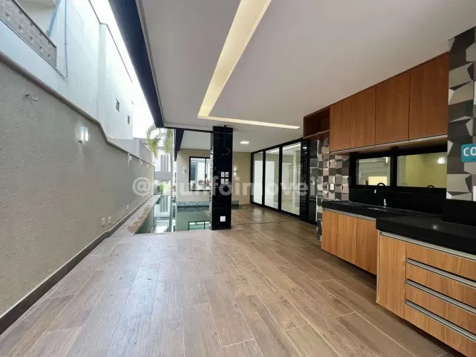 Casa alto padrão a venda em condomínio com 4 suítes