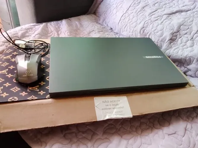 Notebook usado apenas uma semana.