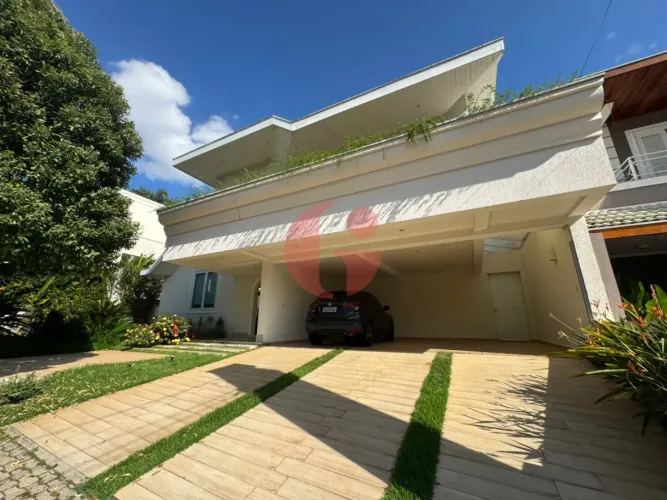 Casa mobiliada em condomínio para venda com 5 suítes e 4 vagas de garagem - 460m² - Jardim