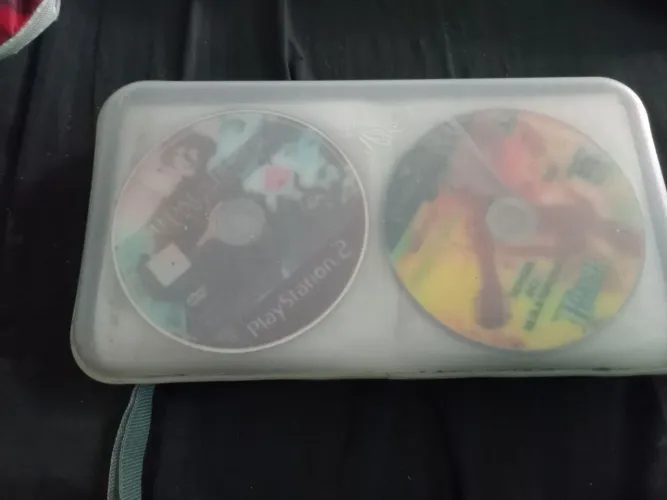 Bolsinha com CDs de Playstation 2 Com +30 Jogos