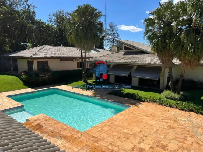 Casa à venda em terreno de 5.000m², com 4 suítes, quadra de tênis, no bairro Gramado - Cam