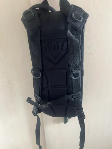 Mochila de hidratação + short de compressão