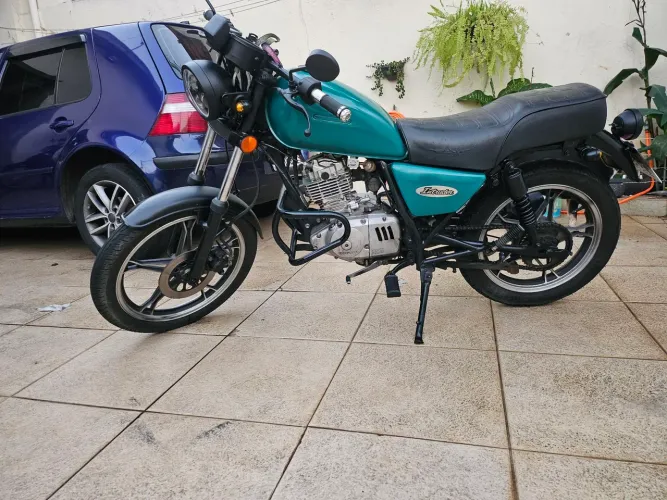 Vendo susuk intruder 125 2010 moto muito boa baixa quilometragem tudo em dia