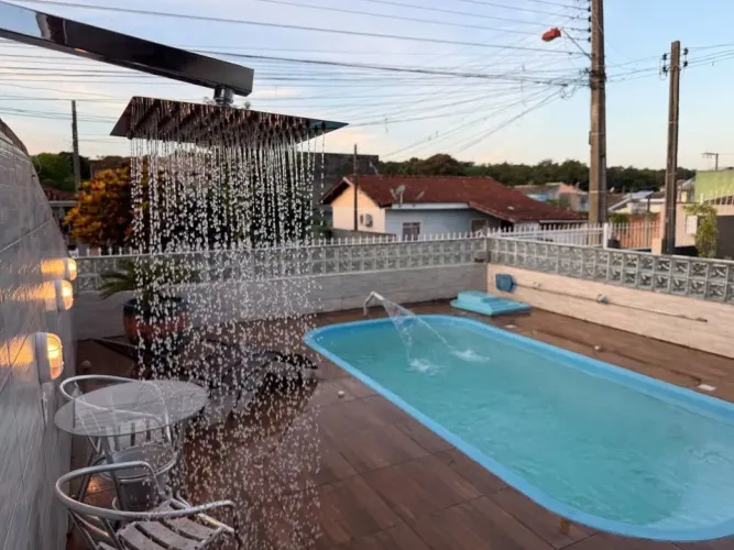 Casa com piscina no Loteamento Lisboa 1, Forquilhas