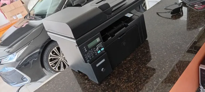 Impressora, Copiadora e Scanner HP M1212nf semi nova