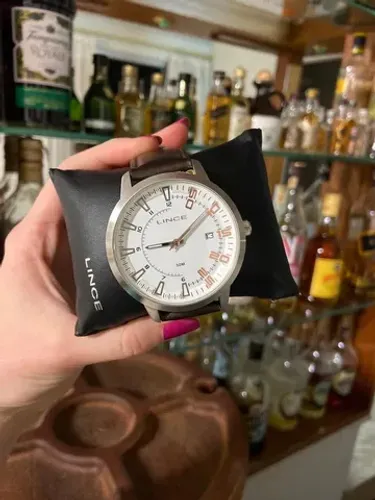 Relógio Lince com pulseira de couro marrom