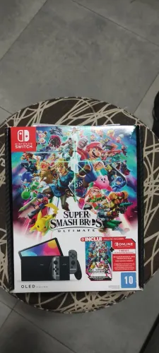 Switch Oled Super Smash Bros - impecável - bloqueado