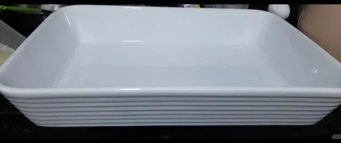 Vende-se Assadeira média branca vidro forneável