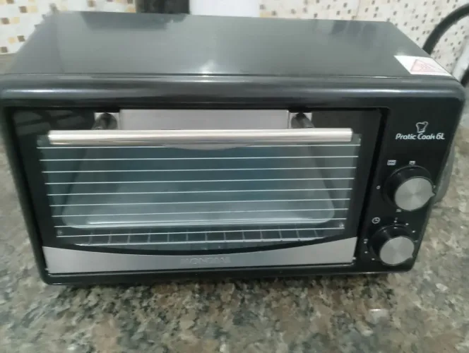 Vendo forninho elétrico marca mundial 6 litros usado funcionando perfeitamente