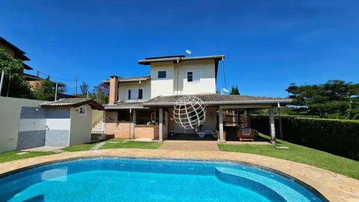 Casa com 3 dormitórios à venda, 202 m² por R$ 1.200.000,00 - Condomínio Santa Fé - Piracai